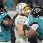 Lawrence rallies Jaguars from 27 down to beat Chargers 31-30