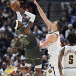 Murray, Jokic help Nuggets rally past Timberwolves 122-118