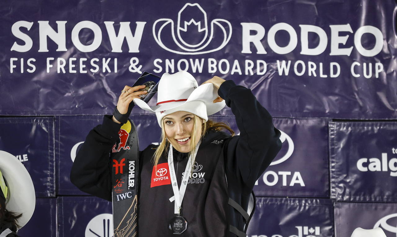 Eileen Gu of China celebrates on the podium after her victory in the women's World Cup freestyle sk...