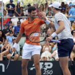 Djokovic gets warm welcome in doubles loss at Adelaide