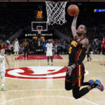 Holiday, Lopez help Bucks hold off Hawks, 114-105