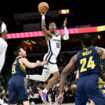 Grizzlies use Morant's triple-double, rally to beat Pacers