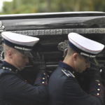 Pelé buried at cemetery in Brazilian city he made famous
