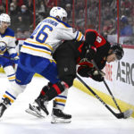 Lucchini scores 1st, Senators end Sabres' 6-game win streak