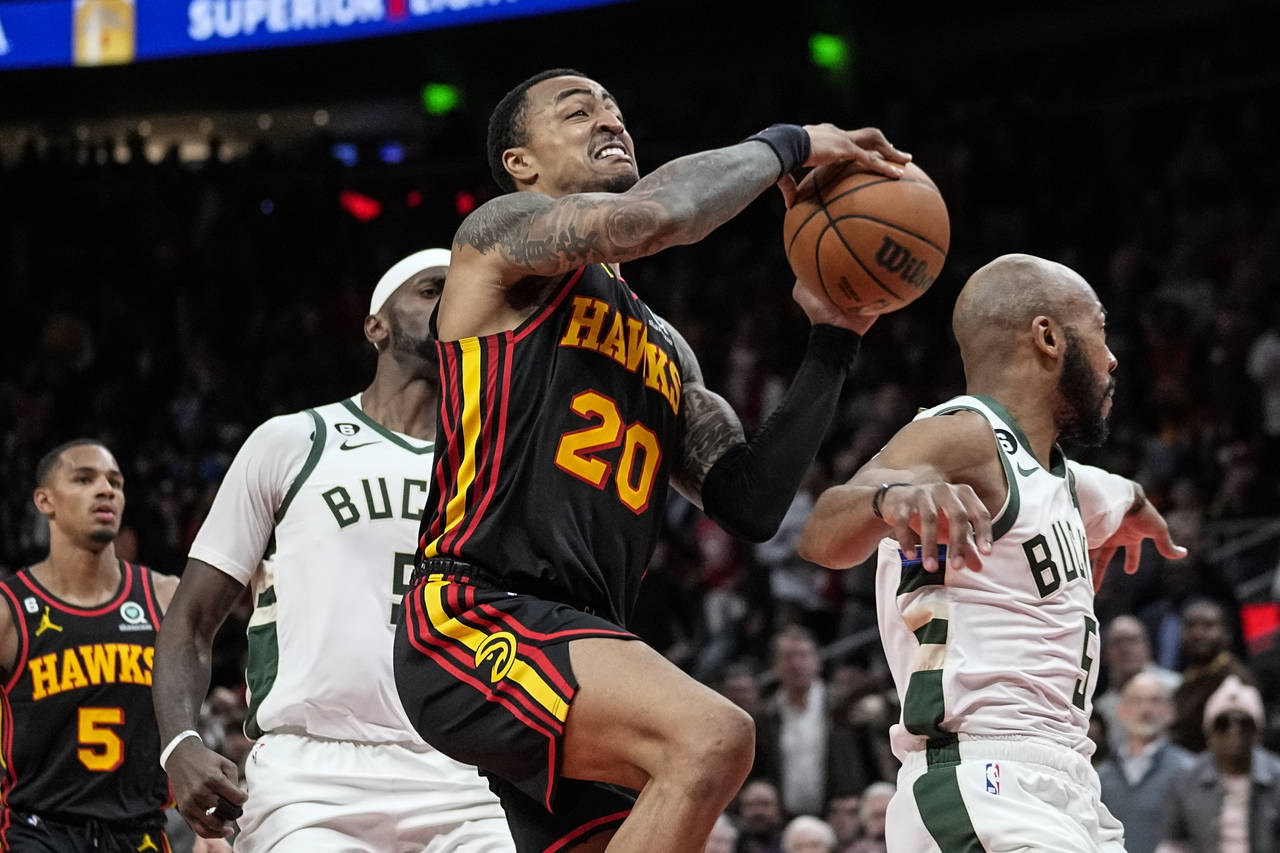 Atlanta Hawks forward John Collins (20) goes to the basket during the second half of the team's NBA...