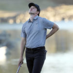 Rahm ties rookie Thompson for AmEx lead at 23 under