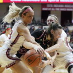Holmes scores 22, No. 4 Indiana women outlast Nebraska in OT
