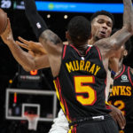 Holiday, Lopez help Bucks hold off Hawks, 114-105