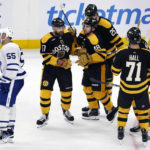 Grzelcyk breaks tie late, Bruins beat Maple Leafs 4-3