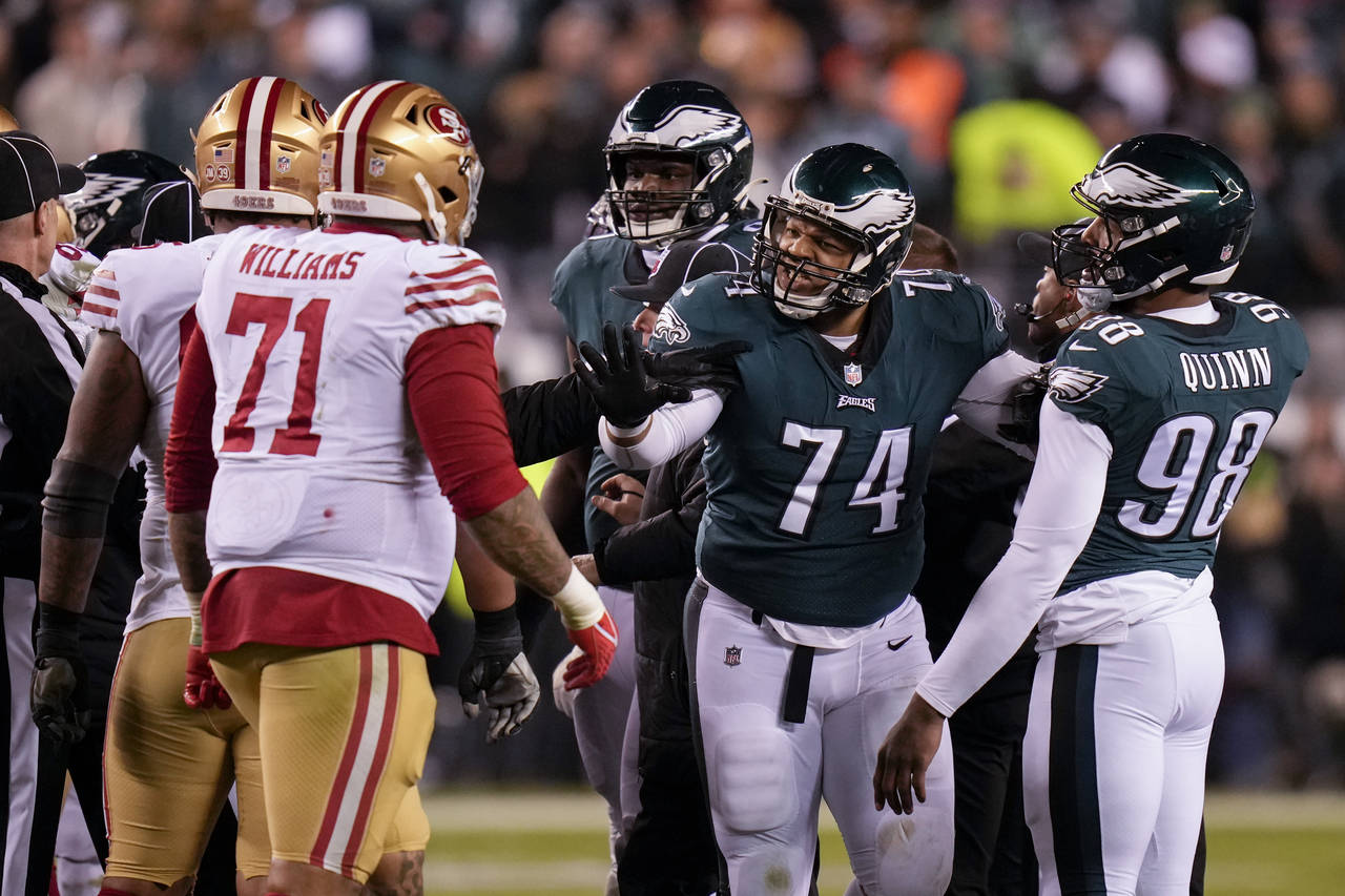 Philadelphia Eagles defensive tackle Ndamukong Suh (74) talks with San Francisco 49ers offensive ta...