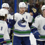 Stamkos scores 499th goal, Lightning beat Canucks 5-4