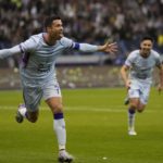 Bruised Ronaldo scores twice to edge showdown with Messi