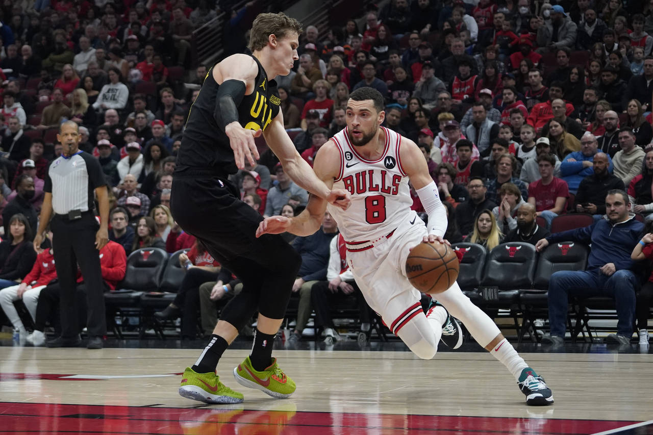 Utah Jazz forward Lauri Markkanen (23) defends Chicago Bulls guard Zach LaVine (8) during the first...