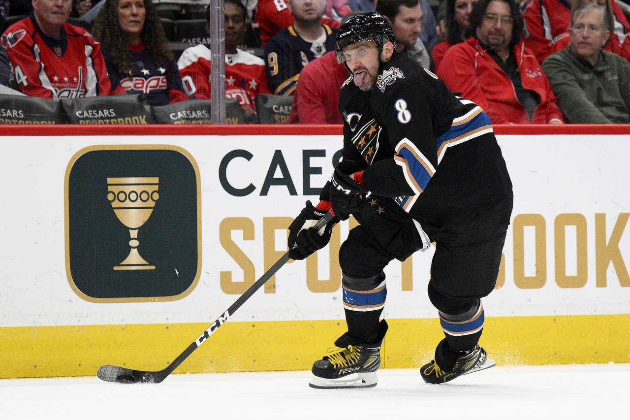 Washington Capitals left wing Alex Ovechkin skates with the puck during the second period of the te...