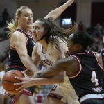 Holmes scores 22, No. 4 Indiana women outlast Nebraska in OT