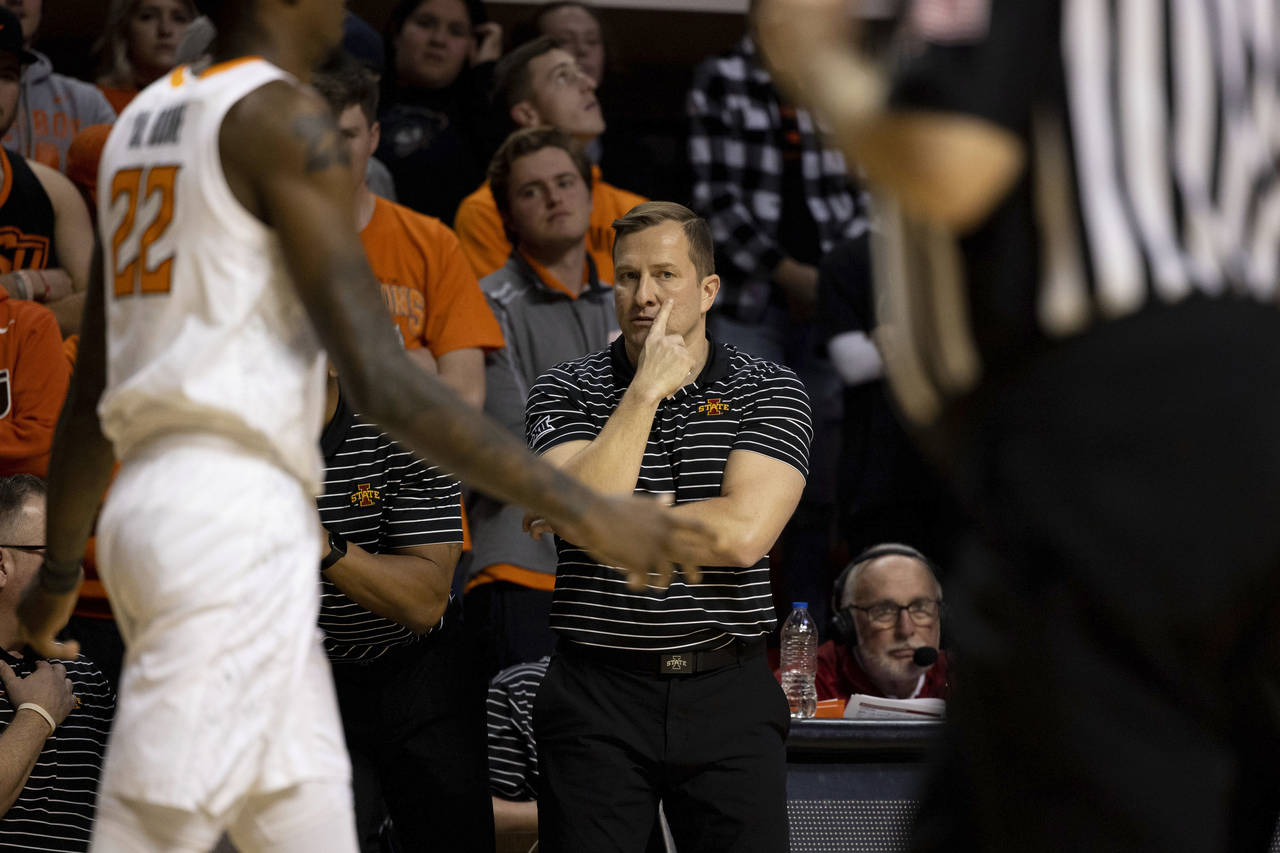 Iowa State head coach T.J. Otzelberger reacts from the baseline of the NCAA college basketball game...