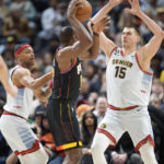 Jokic, Nuggets rout Suns 126-97 for 12th straight home win