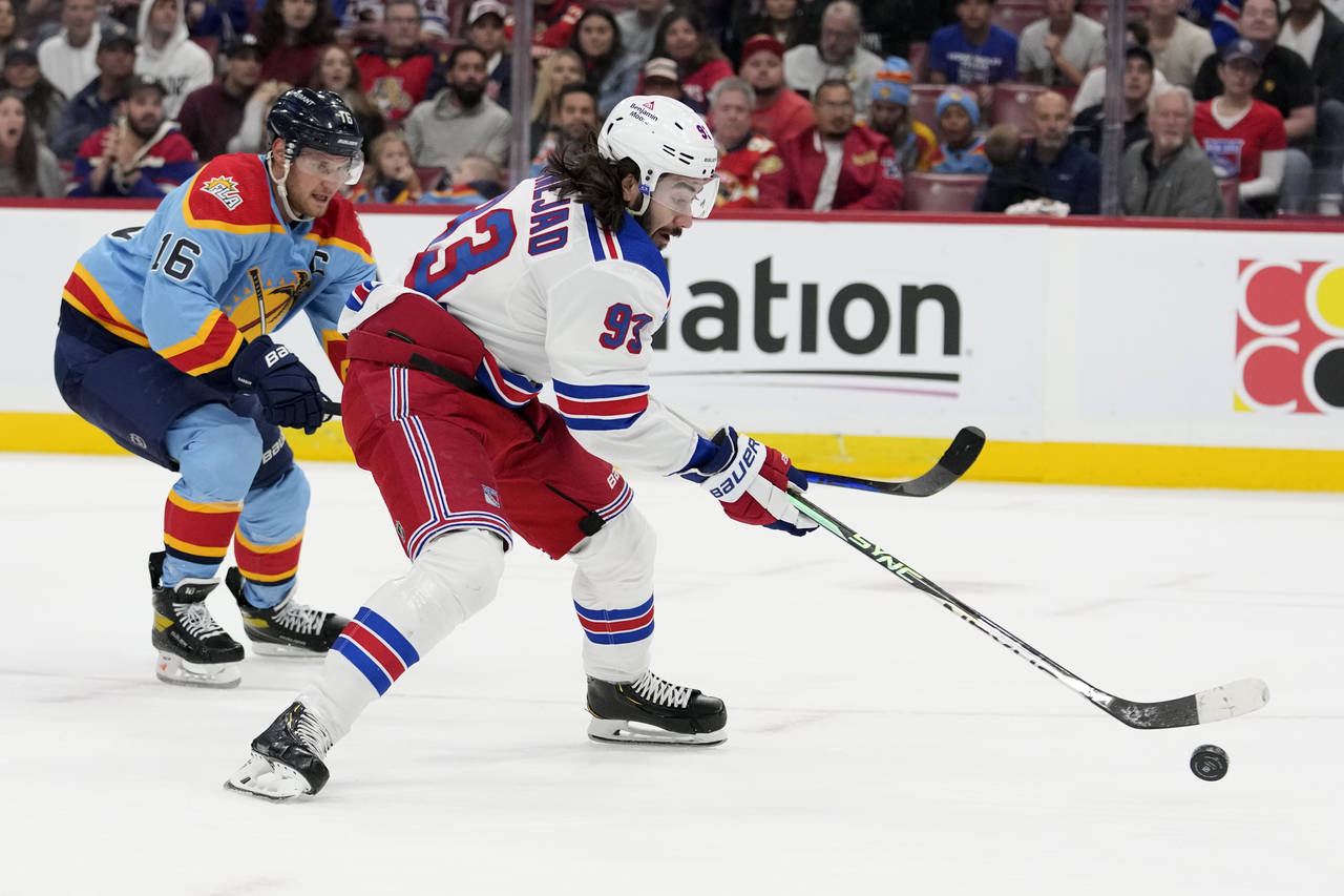 New York Rangers center Mika Zibanejad (93) prepares to shoot to score a goal as Florida Panthers c...