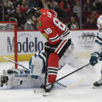 Karlsson gets franchise record as Sharks beat Blackhawks 5-2