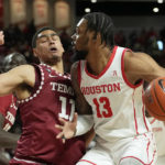 Dunn scores 16, Temple defeats No. 1 Houston 56-55