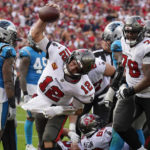 Brady, Bucs rally to beat Panthers 30-24, clinch NFC South