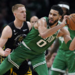 Celtics beat Warriors in OT, win NBA Finals rematch 121-118