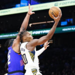 Okogie, Bridges lead short-handed Suns past Pacers 112-107