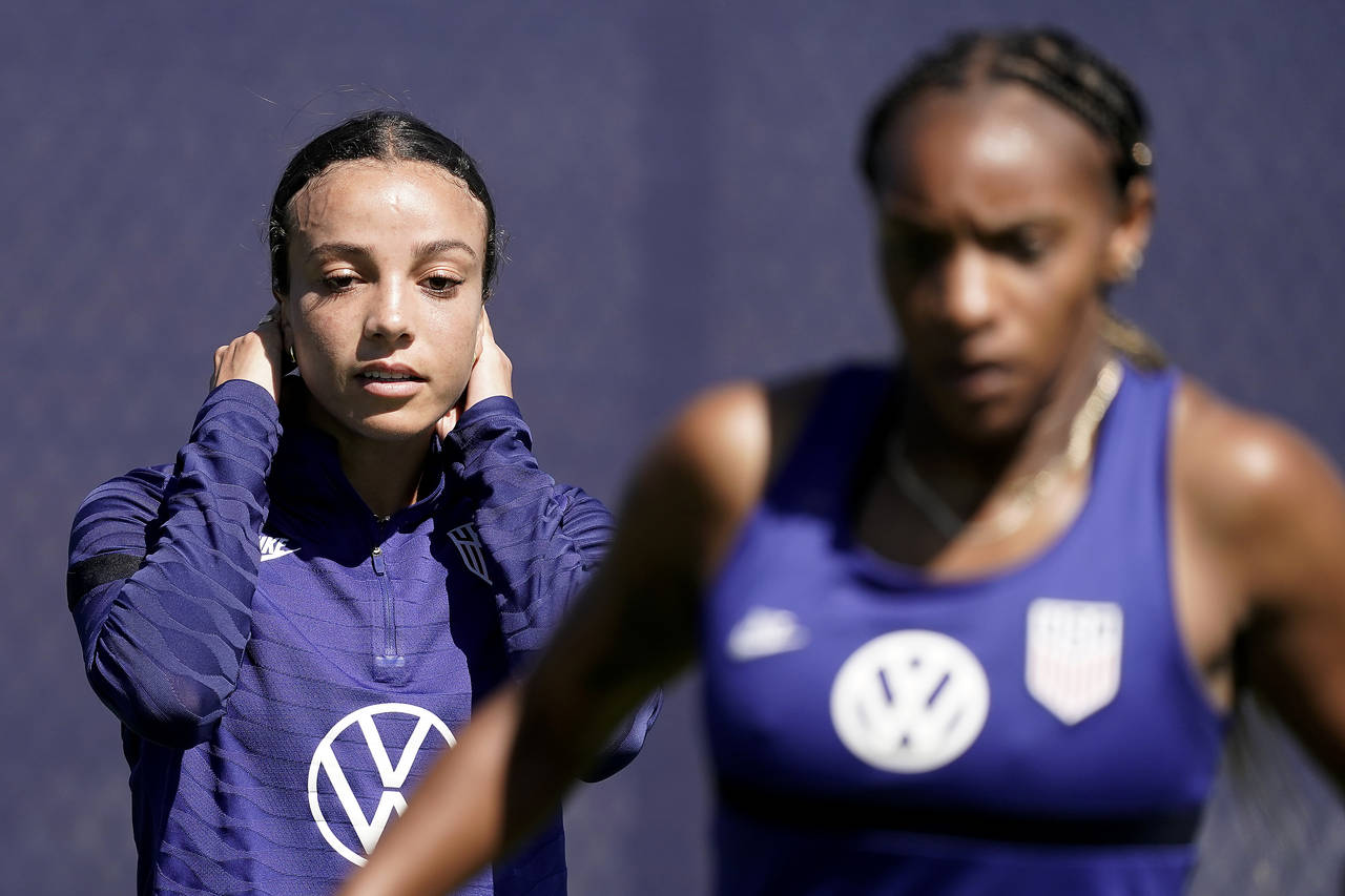 U.S. national team players Crystal Dunn, right, and Sophie Smith practice for a match against Niger...