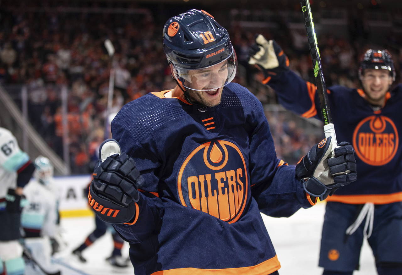 Edmonton Oilers' Derek Ryan (10) celebrates a goal against the Seattle Kraken during the second per...