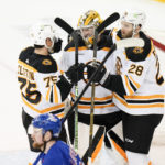 Swayman makes 31 saves as NHL-best Bruins beat Rangers 3-1