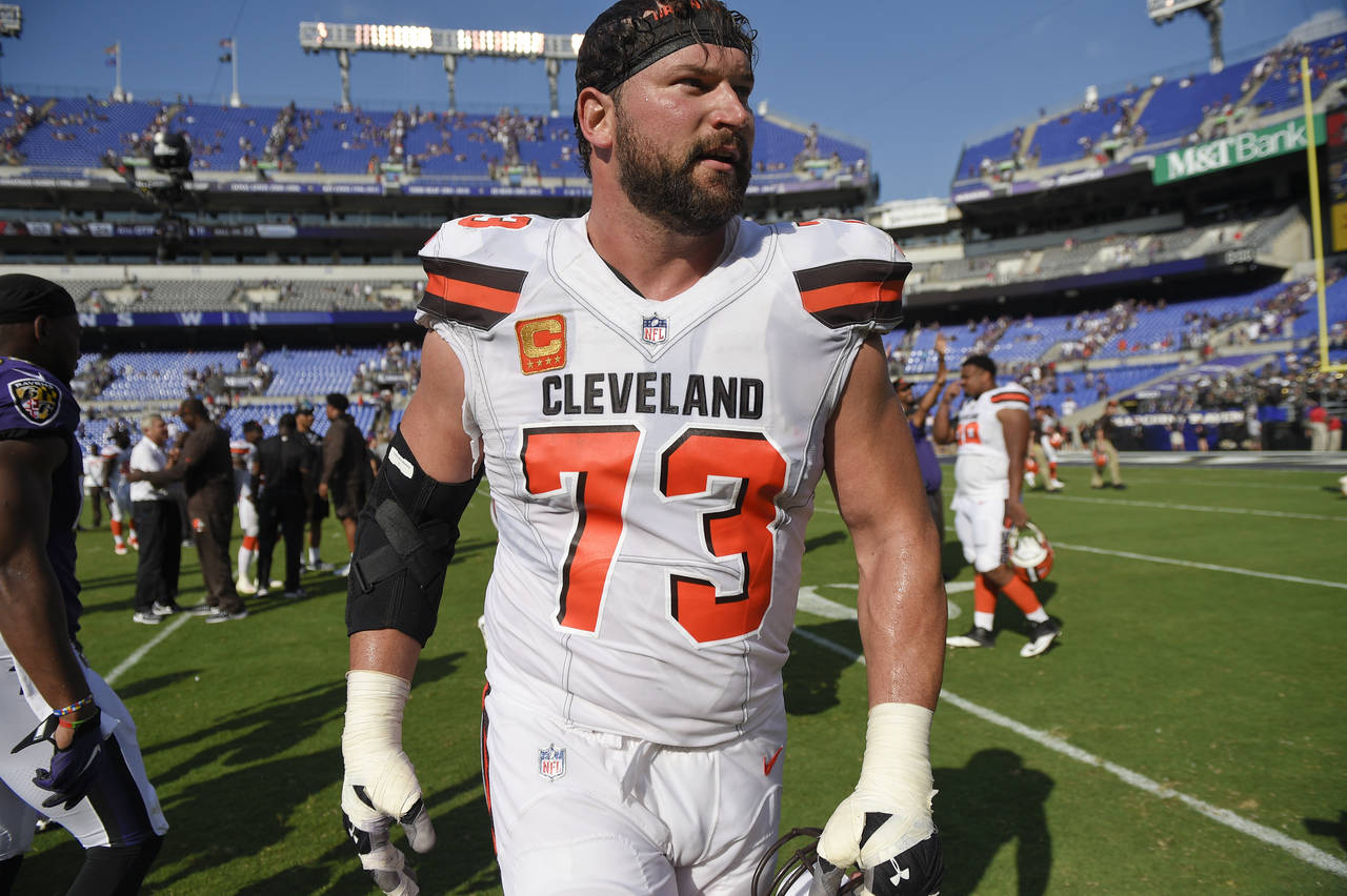 FILE - Cleveland Browns offensive tackle Joe Thomas (73) walks off the field the team's NFL footbal...