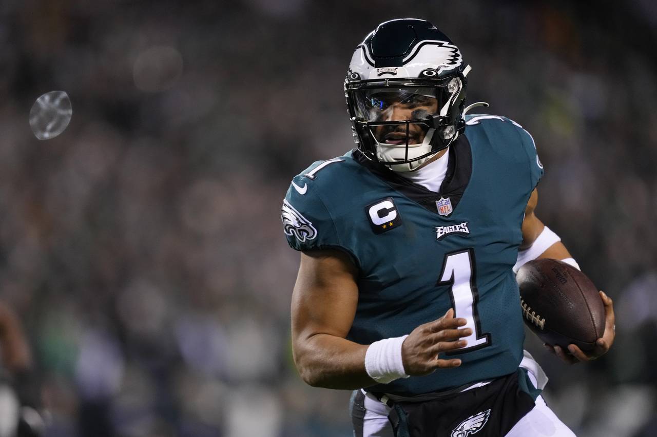 Philadelphia Eagles quarterback Jalen Hurts runs for a touchdown against the New York Giants during...