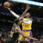 James pours in 43 as Lakers hold off Hornets, 121-115
