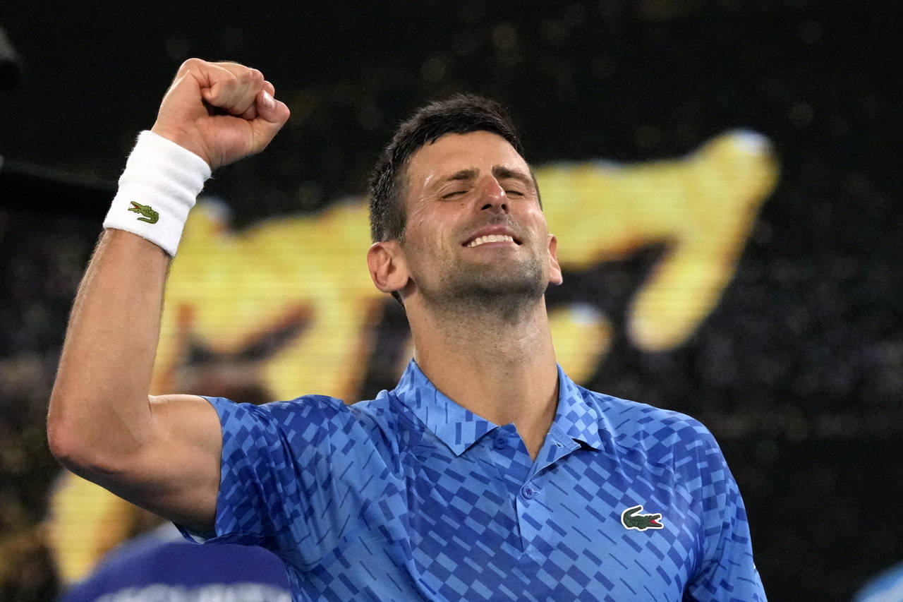 Novak Djokovic of Serbia celebrates after defeating Tommy Paul of the U.S. in their semifinal at th...