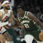 Holiday scores season-high 37, Bucks beat Raptors 130-122