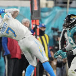 Lawrence rallies Jaguars from 27 down to beat Chargers 31-30