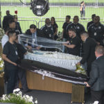 Fans mourn Pelé at public viewing in Brazil stadium