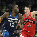 Russell scores 16 points in 4th, Wolves beat Raptors 128-126