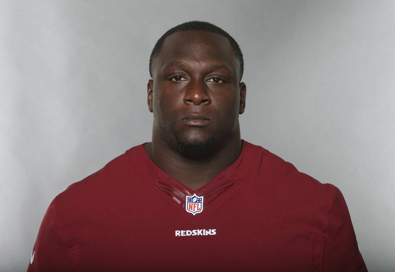 FILE - Jerrell Powe, of the Washington Redskins, poses for a photo in June 2016. Powe, a former Uni...