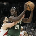 Holiday scores season-high 37, Bucks beat Raptors 130-122