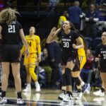 Brink's big day helps No. 2 Stanford hold off Cal 60-56