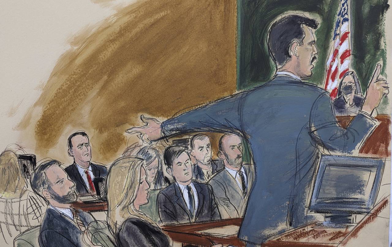 Assistant US Attorney Victor Zapana gives his opening statement while pointing to Hernan Lopez far ...