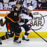 Dube scores in OT, Flames beat Blue Jackets 4-3