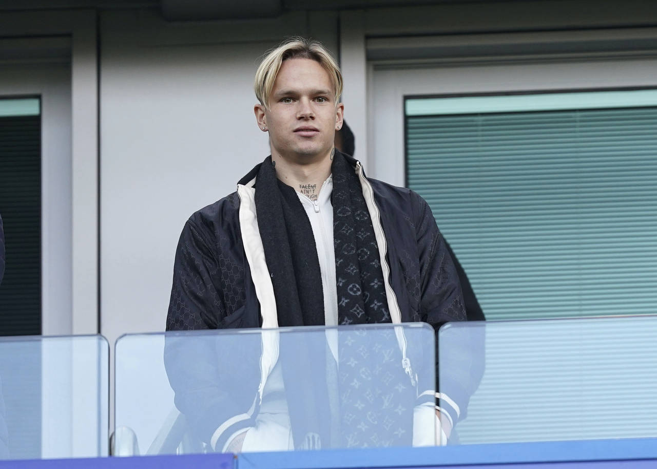 Chelsea new signing Mykhailo Mudryk looks on in the stands ahead of the English Premier League socc...