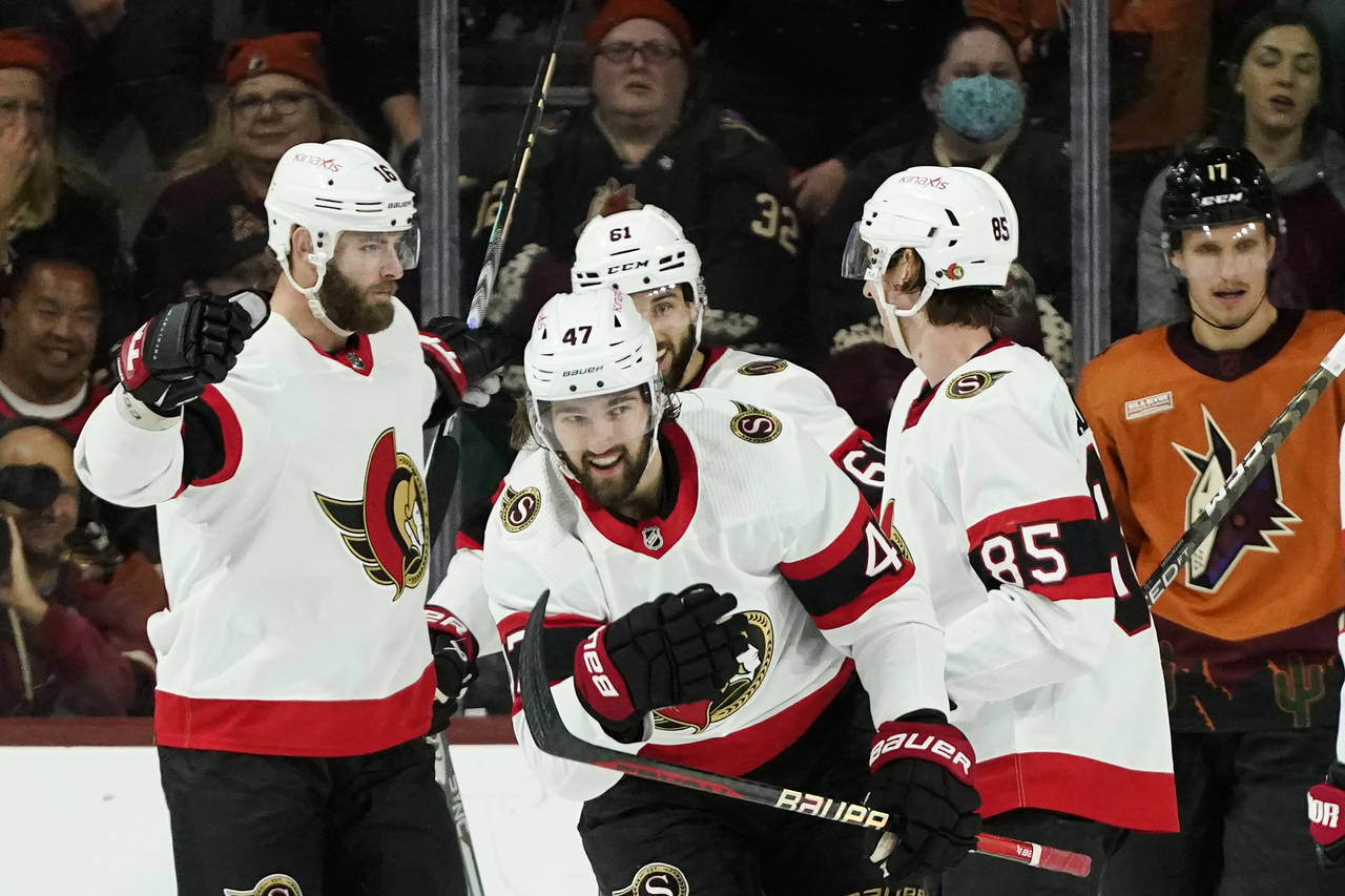 Ottawa Senators center Mark Kastelic (47) smiles as he celebrates his goal against the Arizona Coyo...