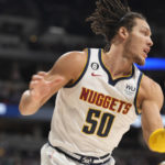 Jokic, Nuggets overcome rim delay, top Celtics 123-111