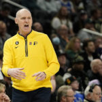 Holiday sparks late rally as Bucks beat Pacers 132-119