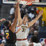 Jokic, Nuggets rout Suns 126-97 for 12th straight home win