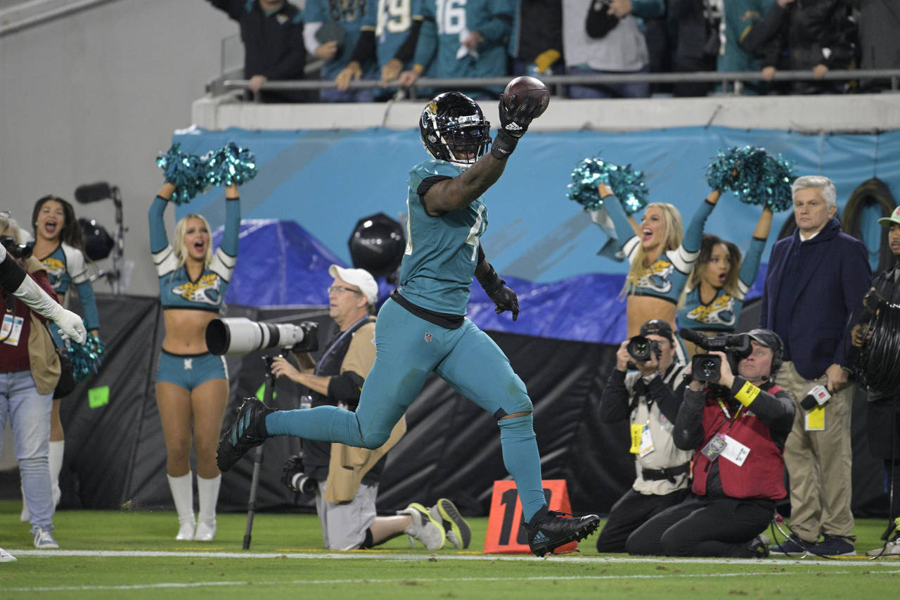 Jacksonville Jaguars linebacker Josh Allen (41) returns a fumble for a touchdown in the second half...