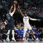 Leonard, George lead Clippers past Mavericks, 112-98